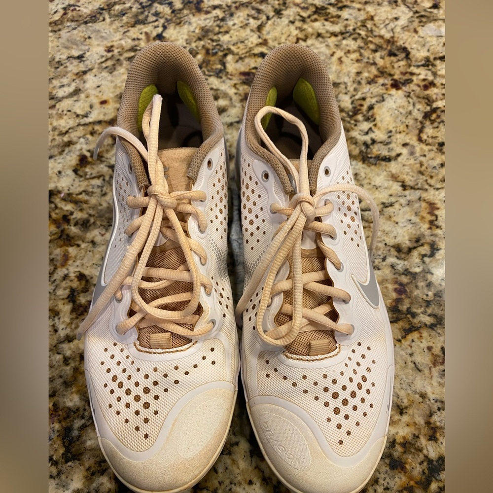 Boys white Nike baseball cleats